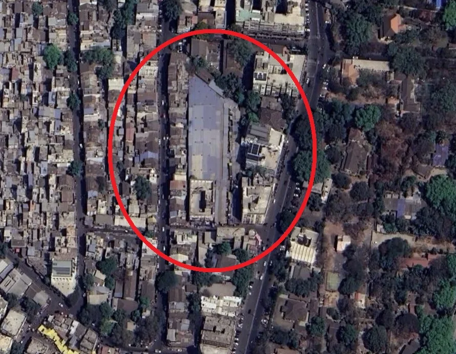 Google Maps satellite view of Fashion Street, Pune Camp, 2026, with cemetery plot circled