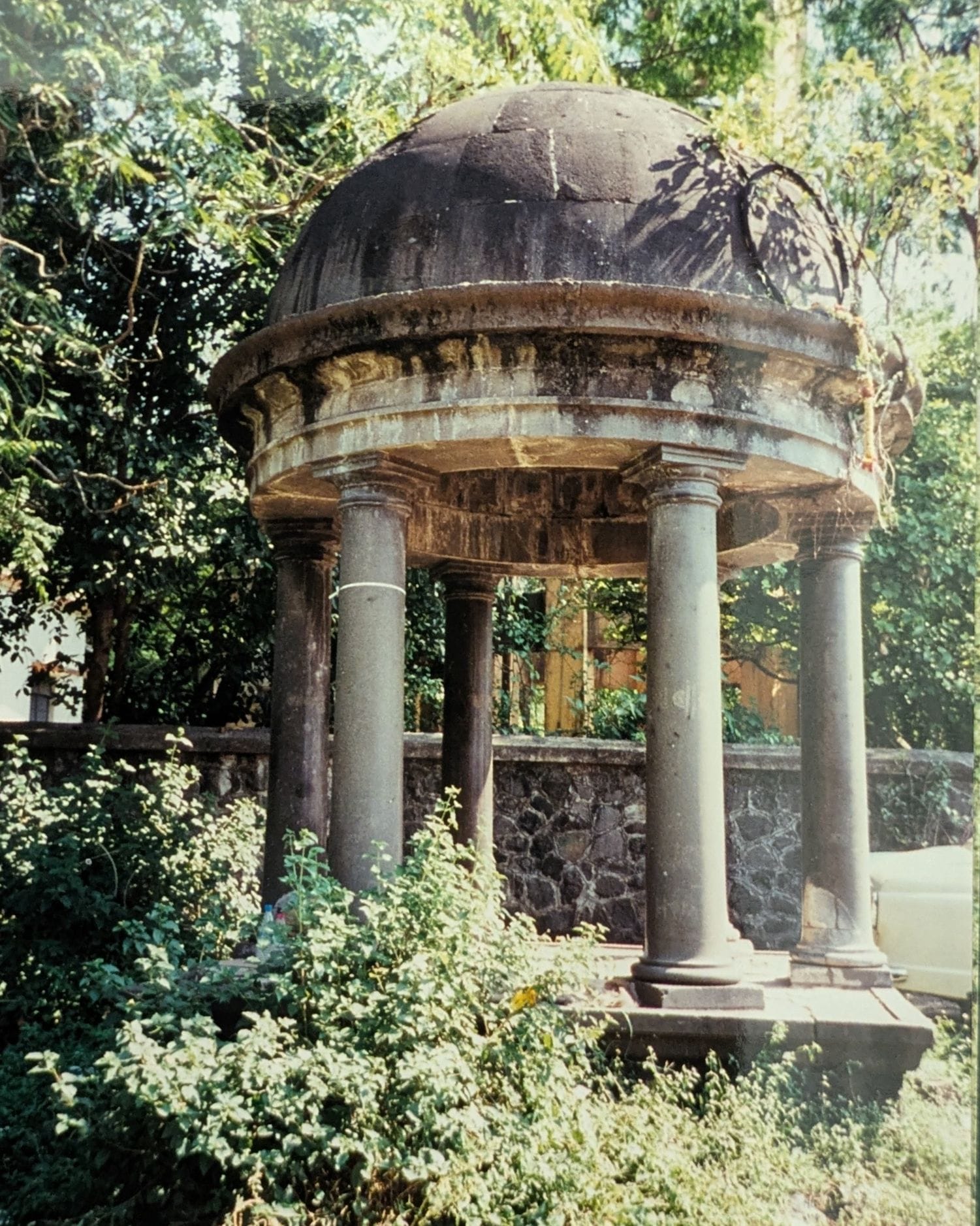 Cut-stone domed tomb on six pillars at the Church Road Cemetery, Pune, carrying no name, date or inscription